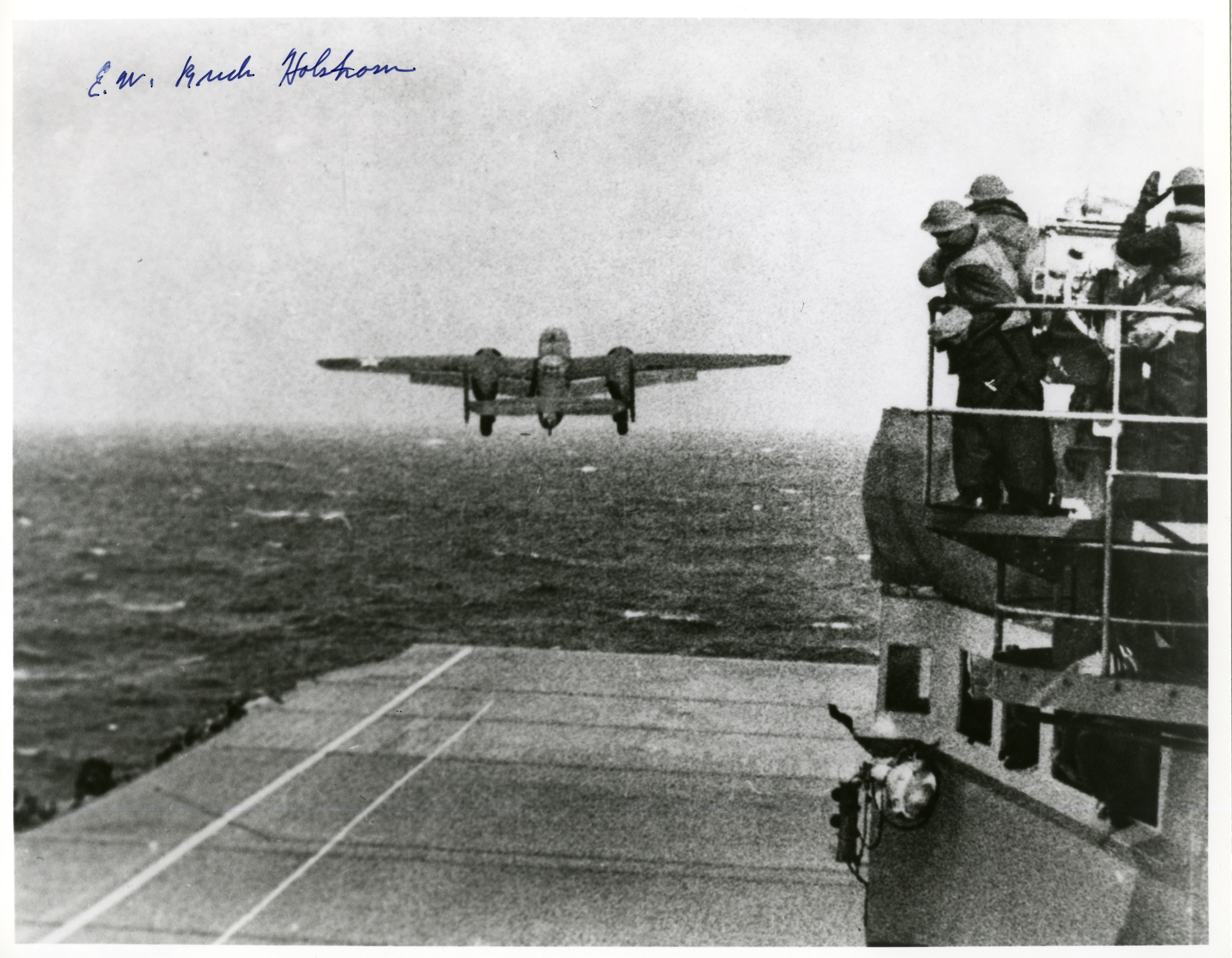B-25 USAAF bomber taking off USS Hornet aircraft carrier to bomb Tokyo, Japan (signed by General Holstrom)