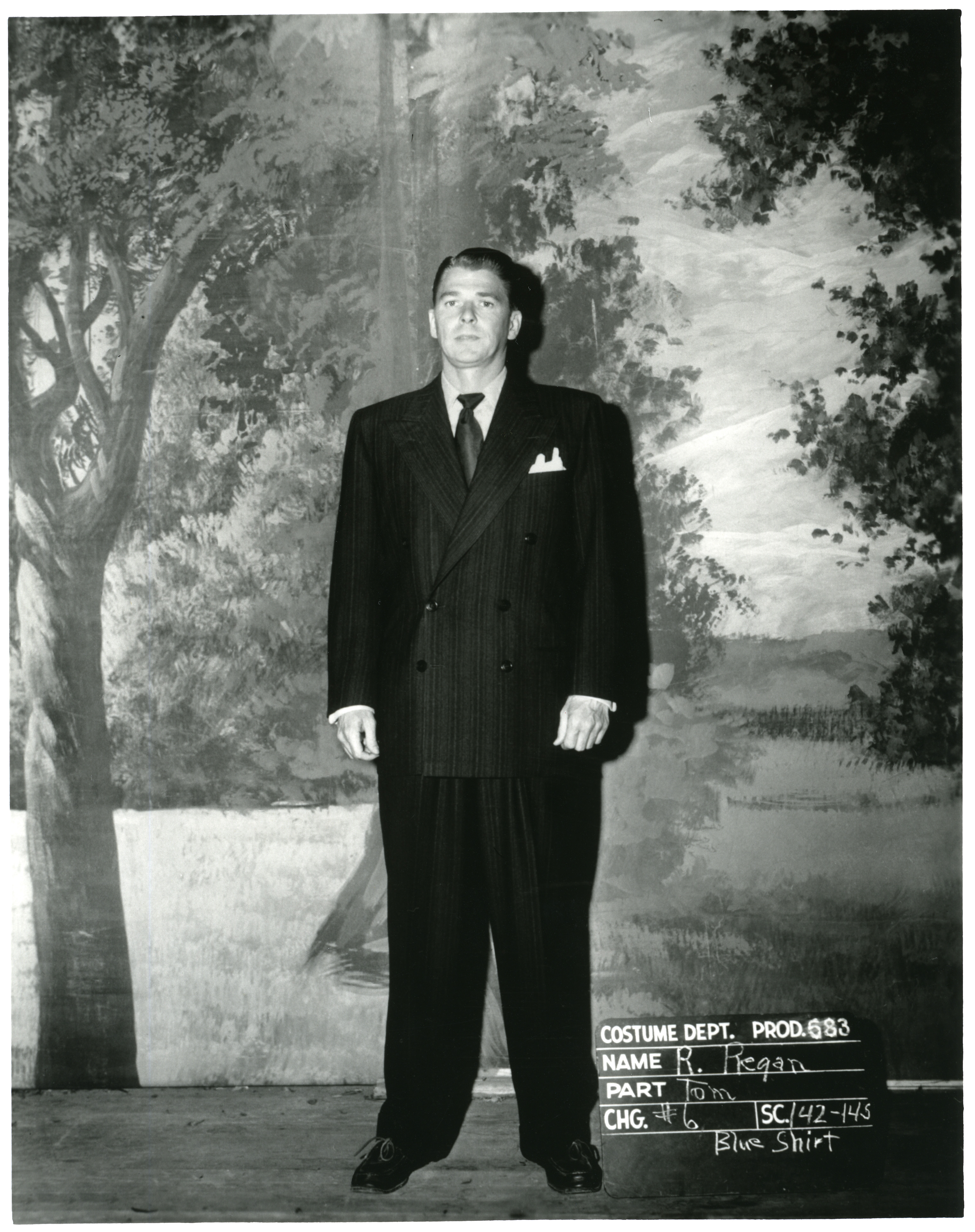 Ronald Reagan in suit from movie costume fitting (full length)