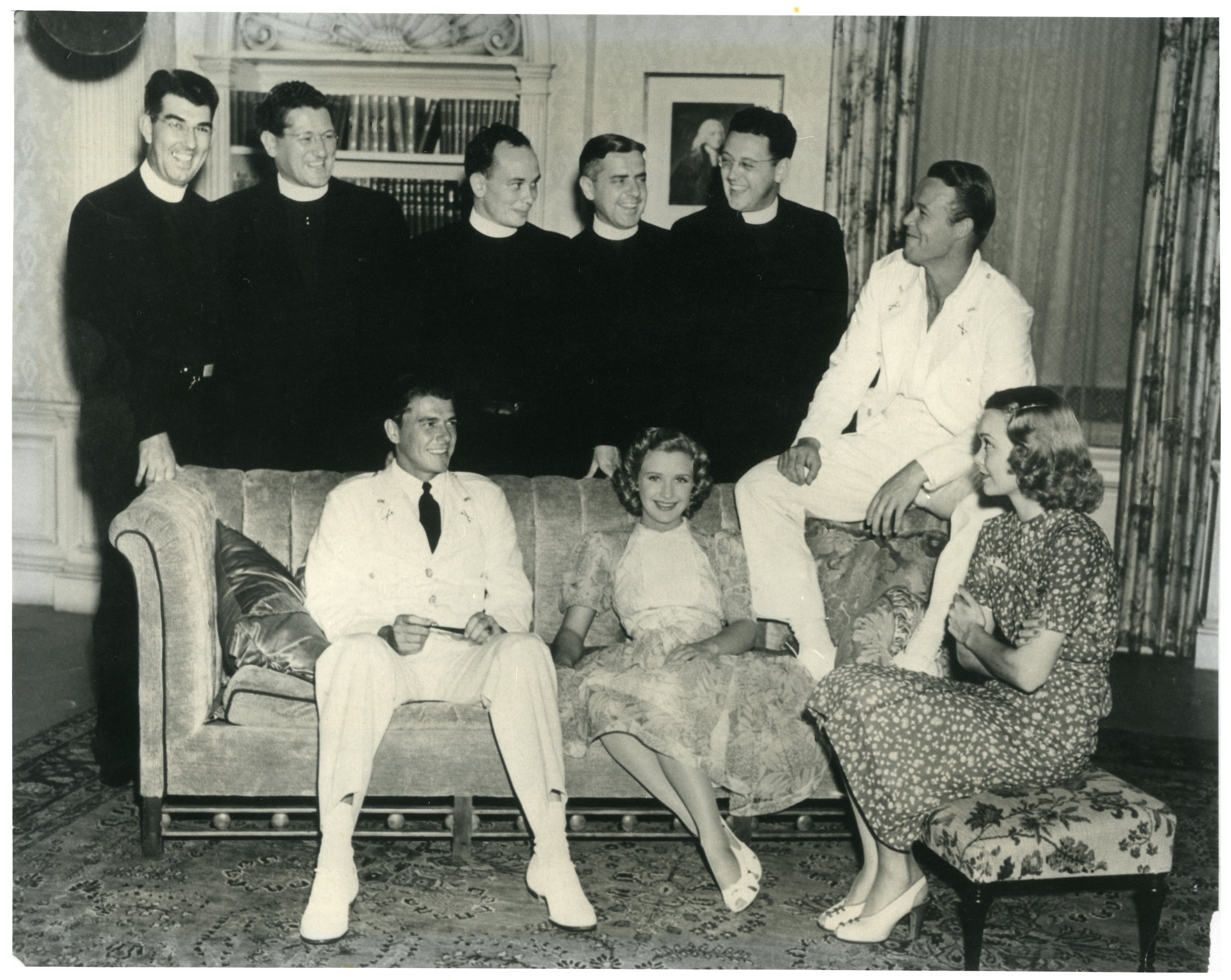 Ronald Reagan, Jane Wyman, Alfie Lambe and other unidentified priests at unknown location