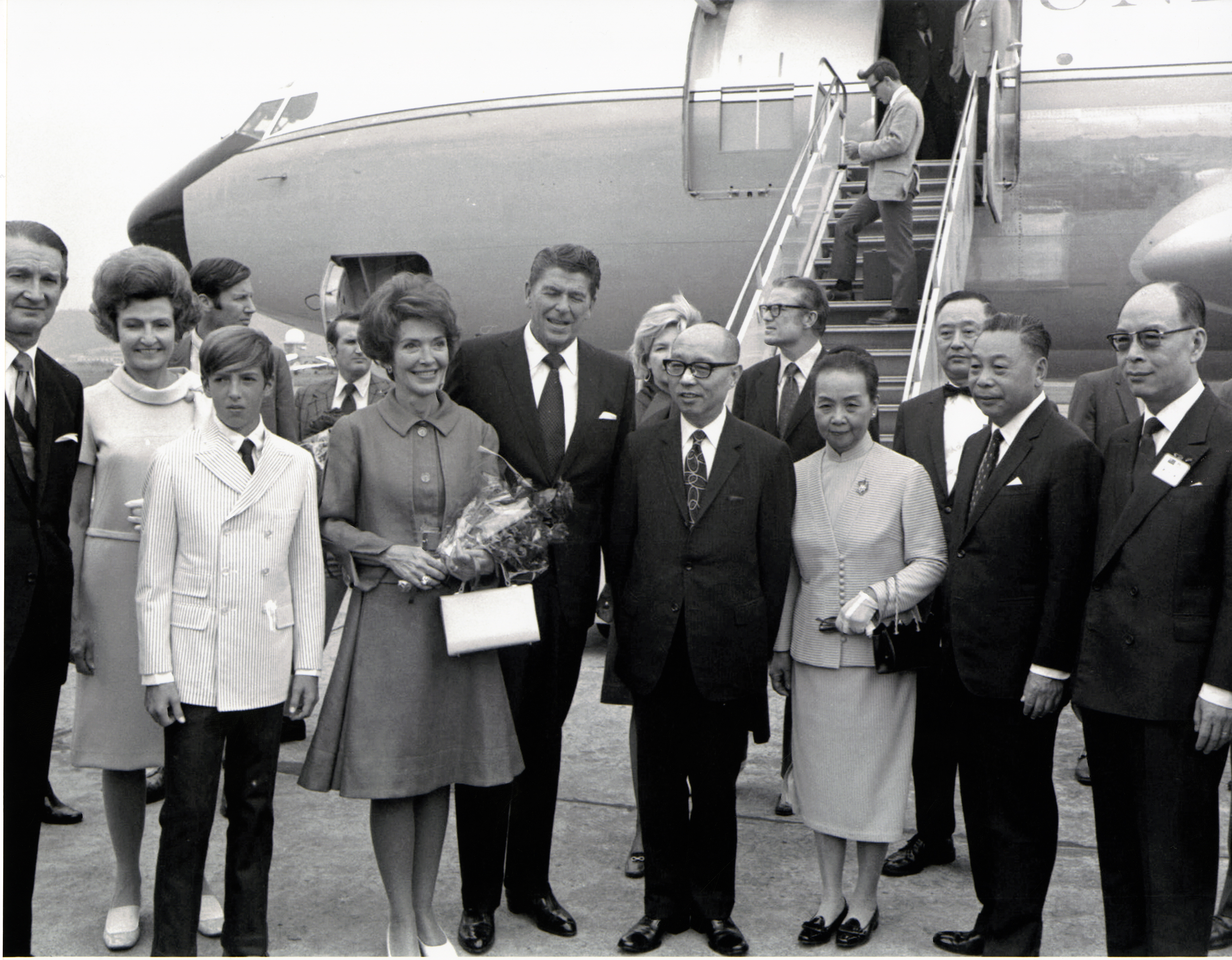 Governor Reagan and Nancy Reagan with Ron Reagan arrival in Taipei greeted by Vice President Yen, Chia-kan and Ching-Kuo