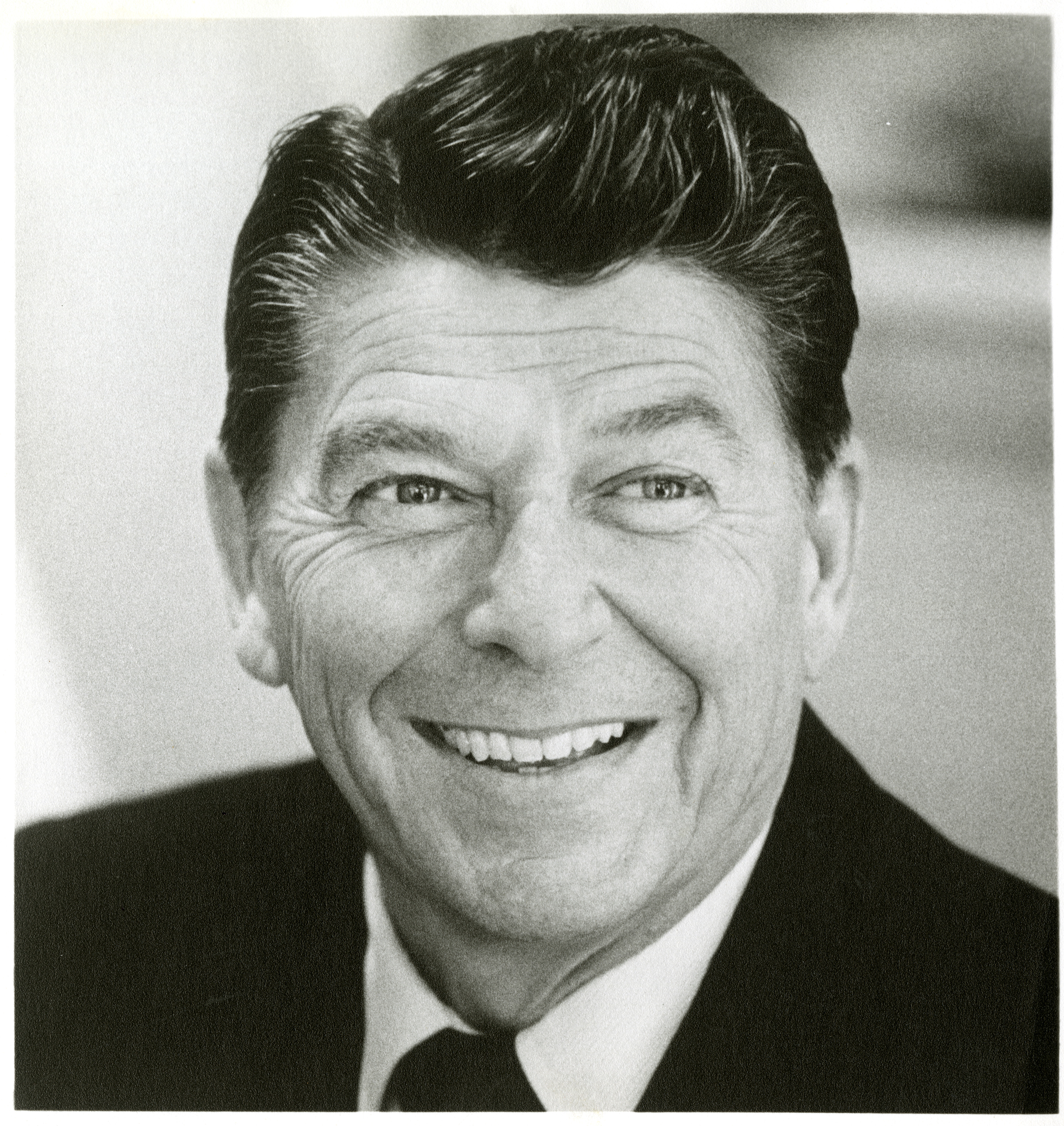 Close-up portrait of Ronald Reagan smiling