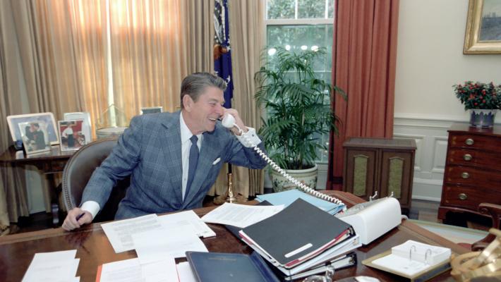President Reagan making a telephone call to the space shuttle. 11/11/1982.